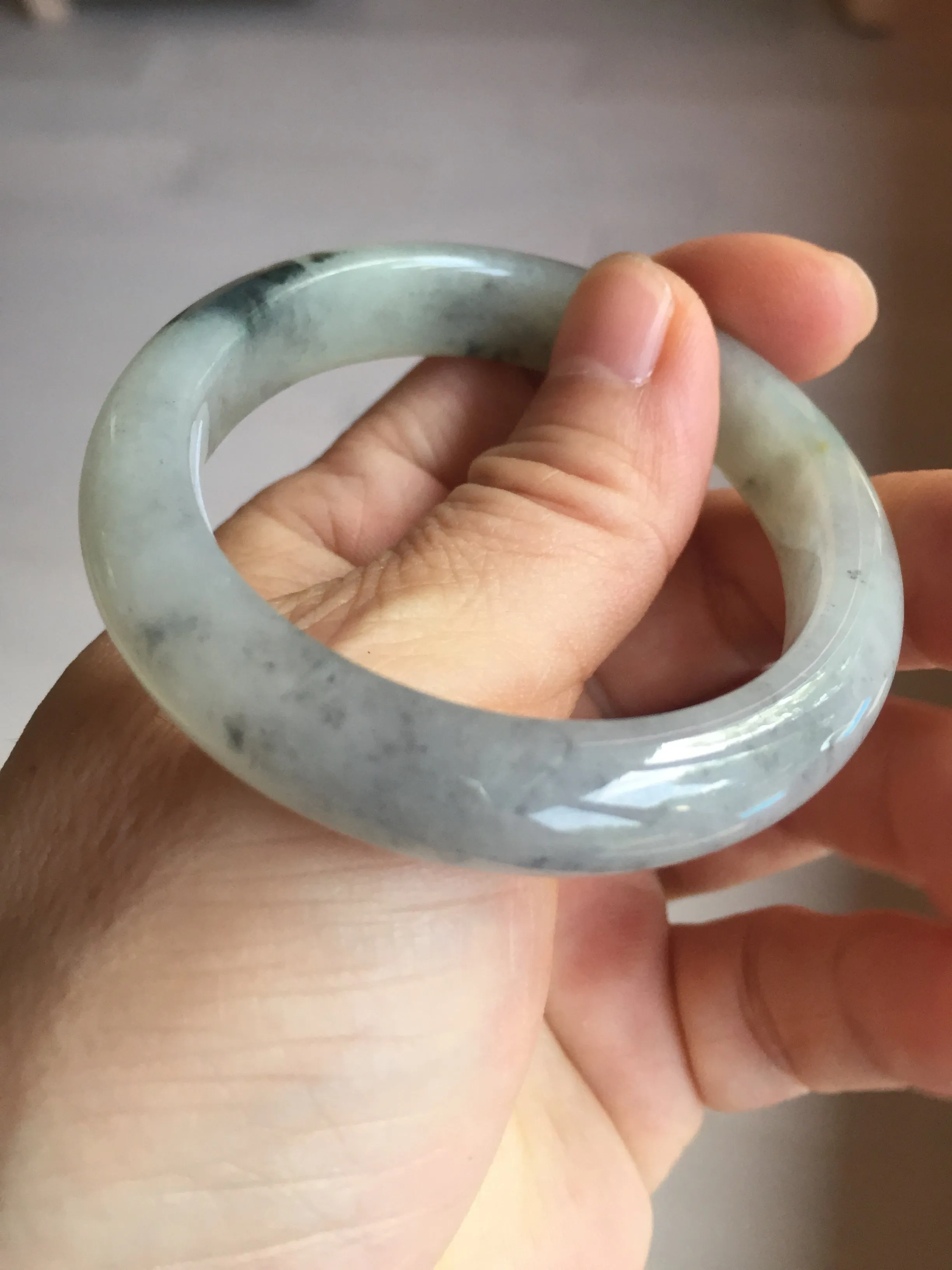48mm Certified 100% natural Type A black/white(wuji) with flying green flowers oval jadeite jade bangle BP24-2671