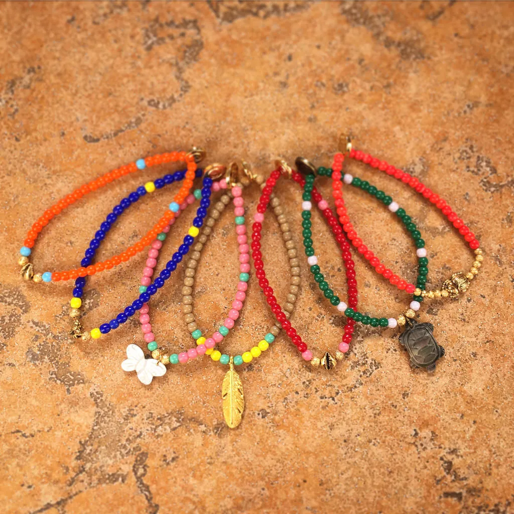 Cowrie Shell Charm Glass Bead Bracelet