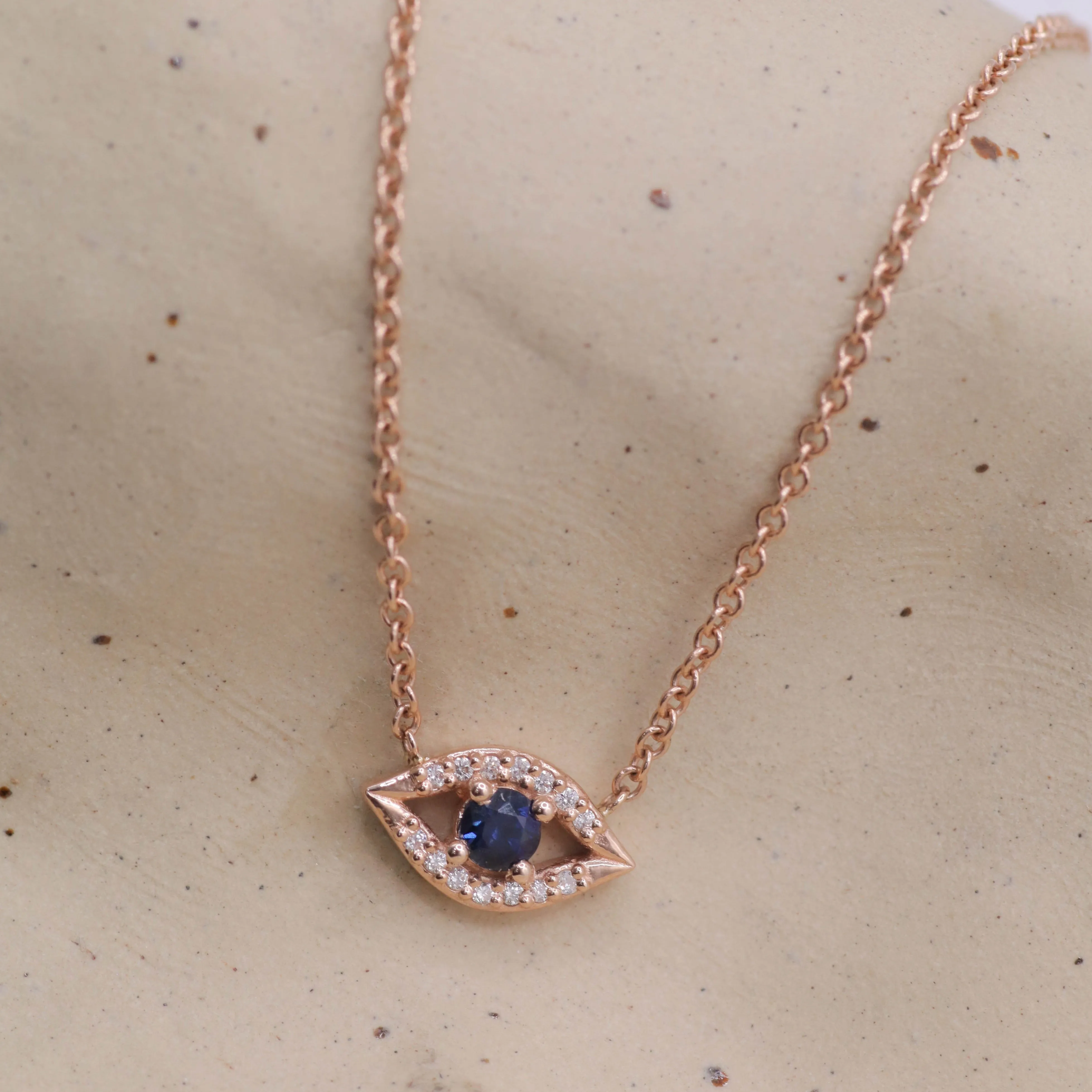 Evil Eye floating Gold Necklace Sapphire and Diamonds