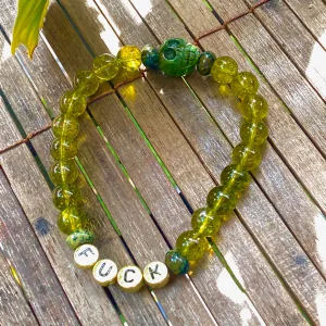 Men’s peridot, green pyrite, green Schiller sheen spar "curse" bracelet