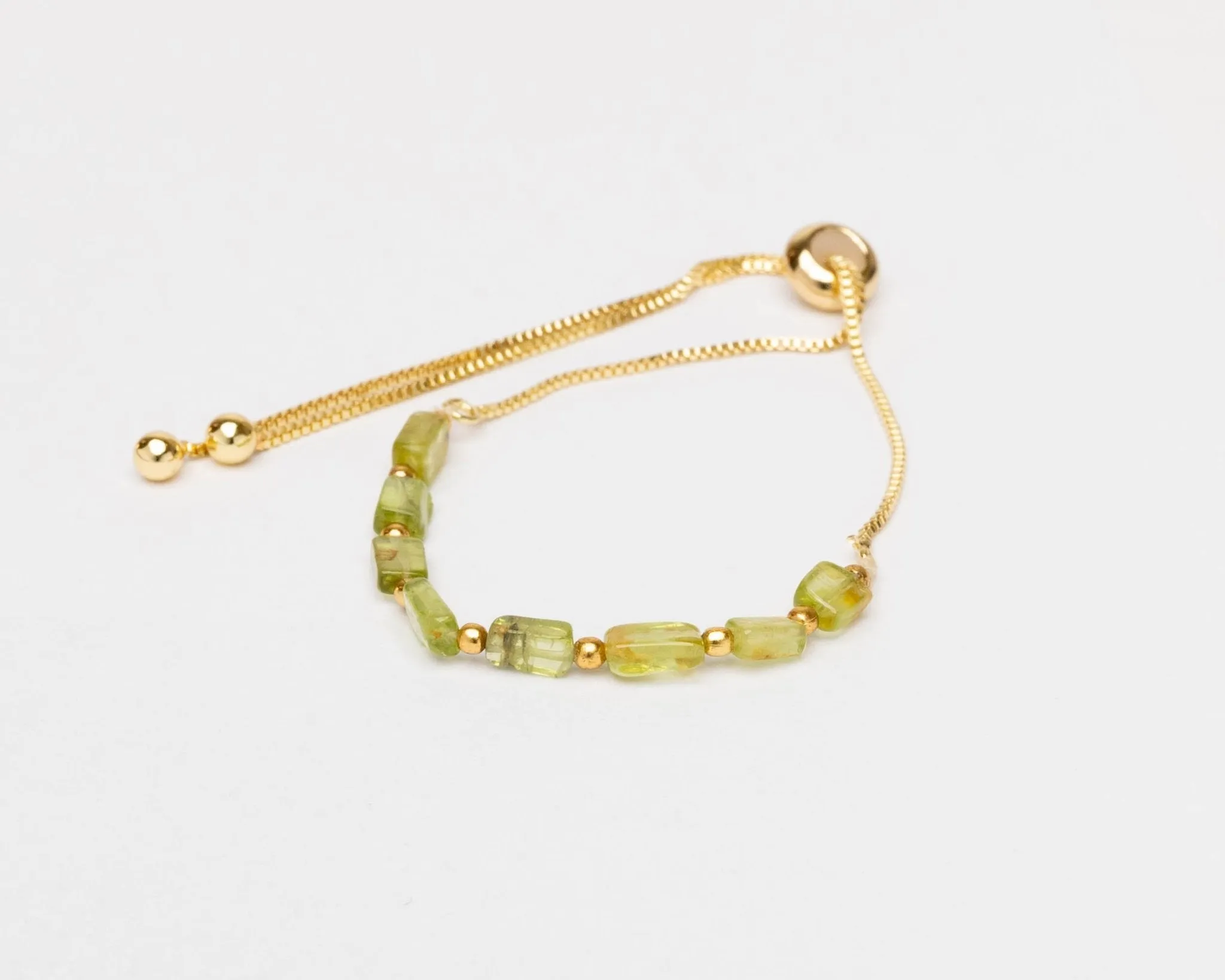 Peridot Faceted With Golden Chain