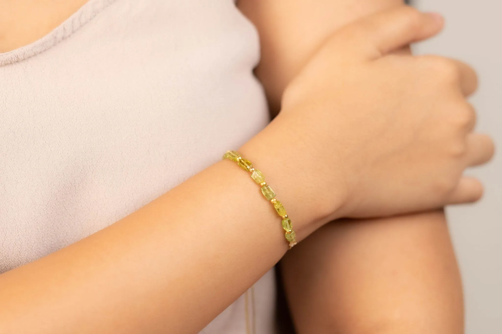 Peridot Faceted With Golden Chain