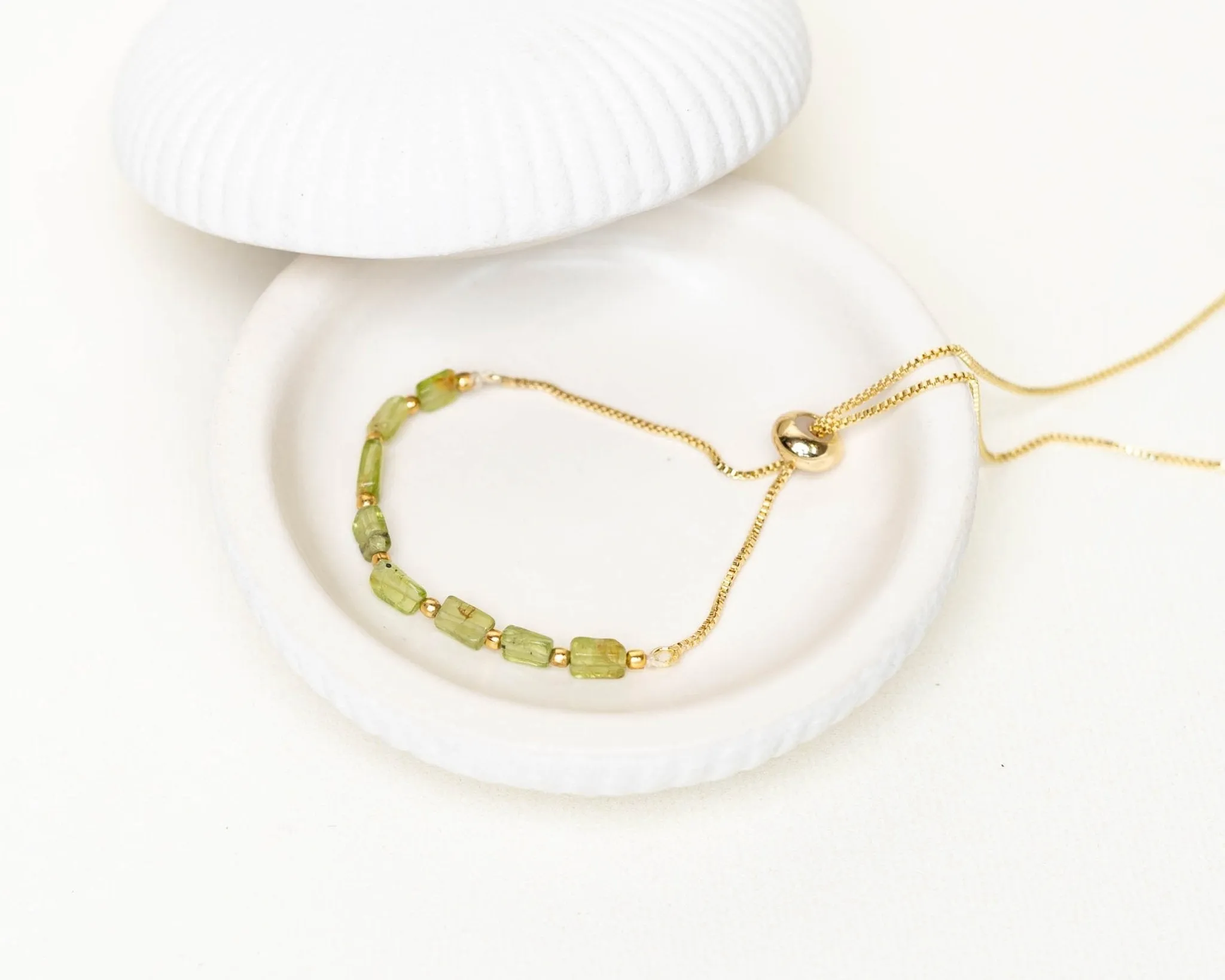 Peridot Faceted With Golden Chain